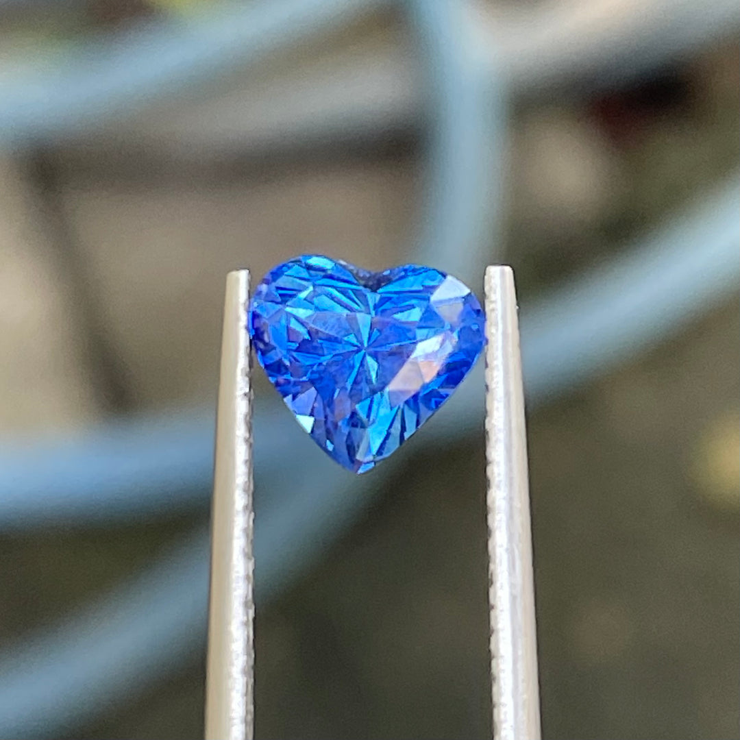 Natural 2.02 carat heart-shaped blue sapphire from Madagascar, measuring 7.8 × 7 × 5.5 mm, clean appearance, heated loose earth-mined gemstone by Crystal Gem &amp; Jewelry.