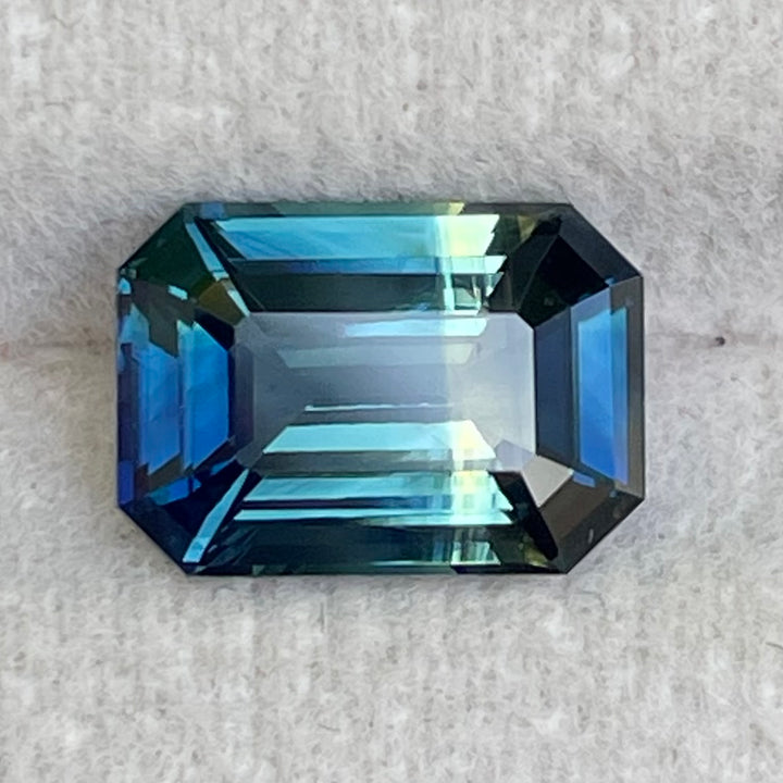 Natural 3.06 carat parti sapphire from Madagascar, emerald shape, unheated, with a 100% clean appearance as described, measuring 9.8 × 7.0 × 4.4 mm, by Crystal Gem &amp; Jewelry.