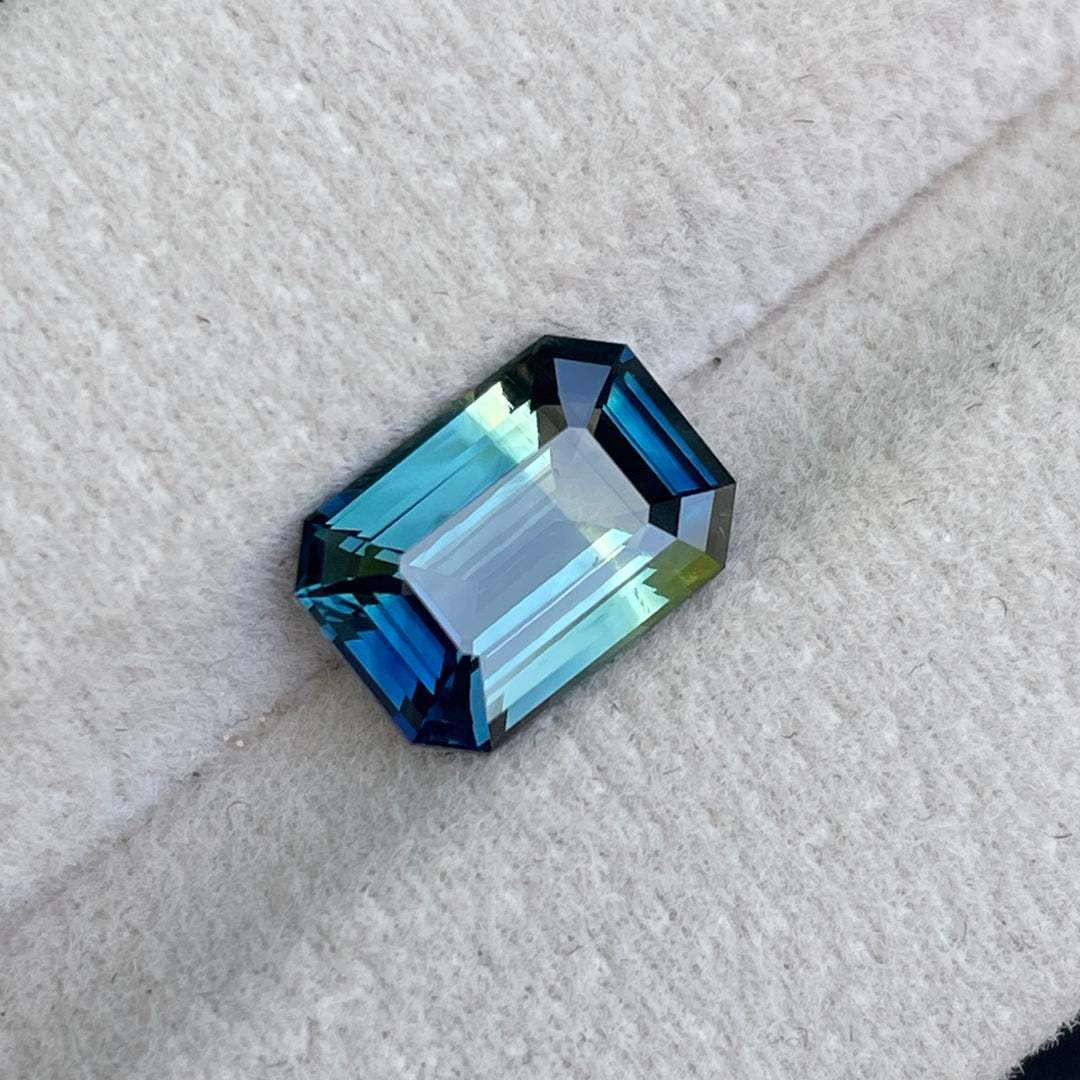 Natural 3.06 carat parti sapphire from Madagascar, emerald shape, unheated, with a 100% clean appearance as described, measuring 9.8 × 7.0 × 4.4 mm, by Crystal Gem &amp; Jewelry.