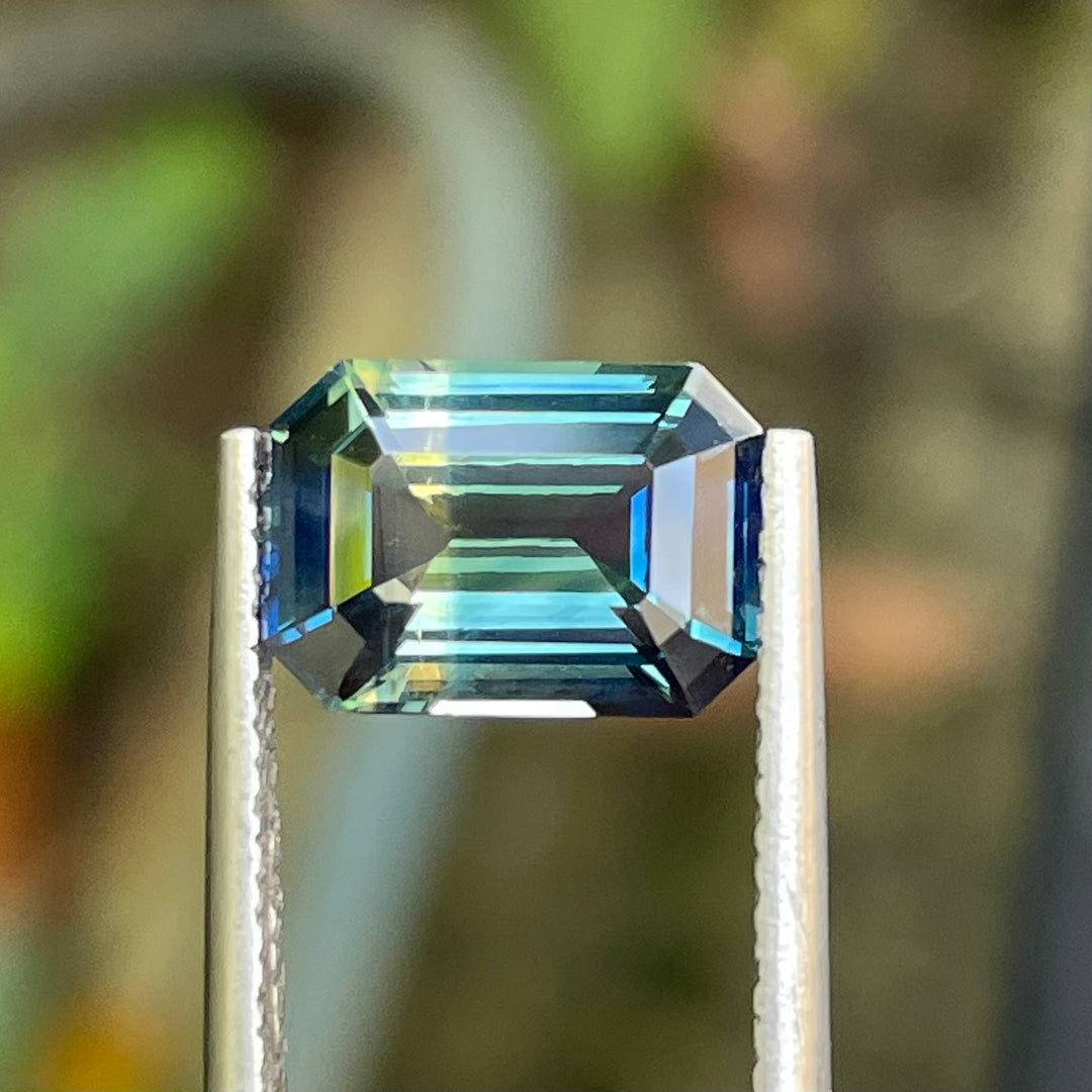 Natural 3.06 carat parti sapphire from Madagascar, emerald shape, unheated, with a 100% clean appearance as described, measuring 9.8 × 7.0 × 4.4 mm, by Crystal Gem &amp; Jewelry.