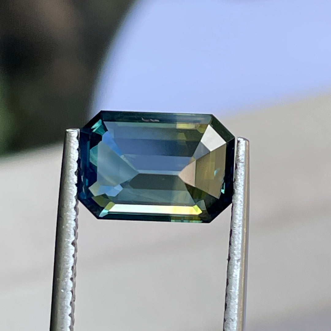 Natural 3.06 carat parti sapphire from Madagascar, emerald shape, unheated, with a 100% clean appearance as described, measuring 9.8 × 7.0 × 4.4 mm, by Crystal Gem &amp; Jewelry.
