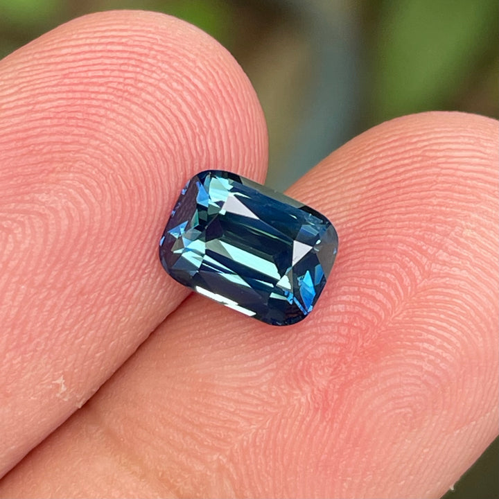 Natural 2.03 carat teal sapphire from Madagascar, radiant cut, unheated with a clean appearance, measuring 8 × 5.8 × 4.3 mm, loose earth-mined gemstone by Crystal Gem &amp; Jewelry.