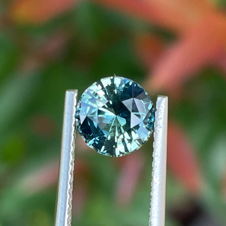 Bespoke fine unheated teal sapphire for bespoke engagement ring 