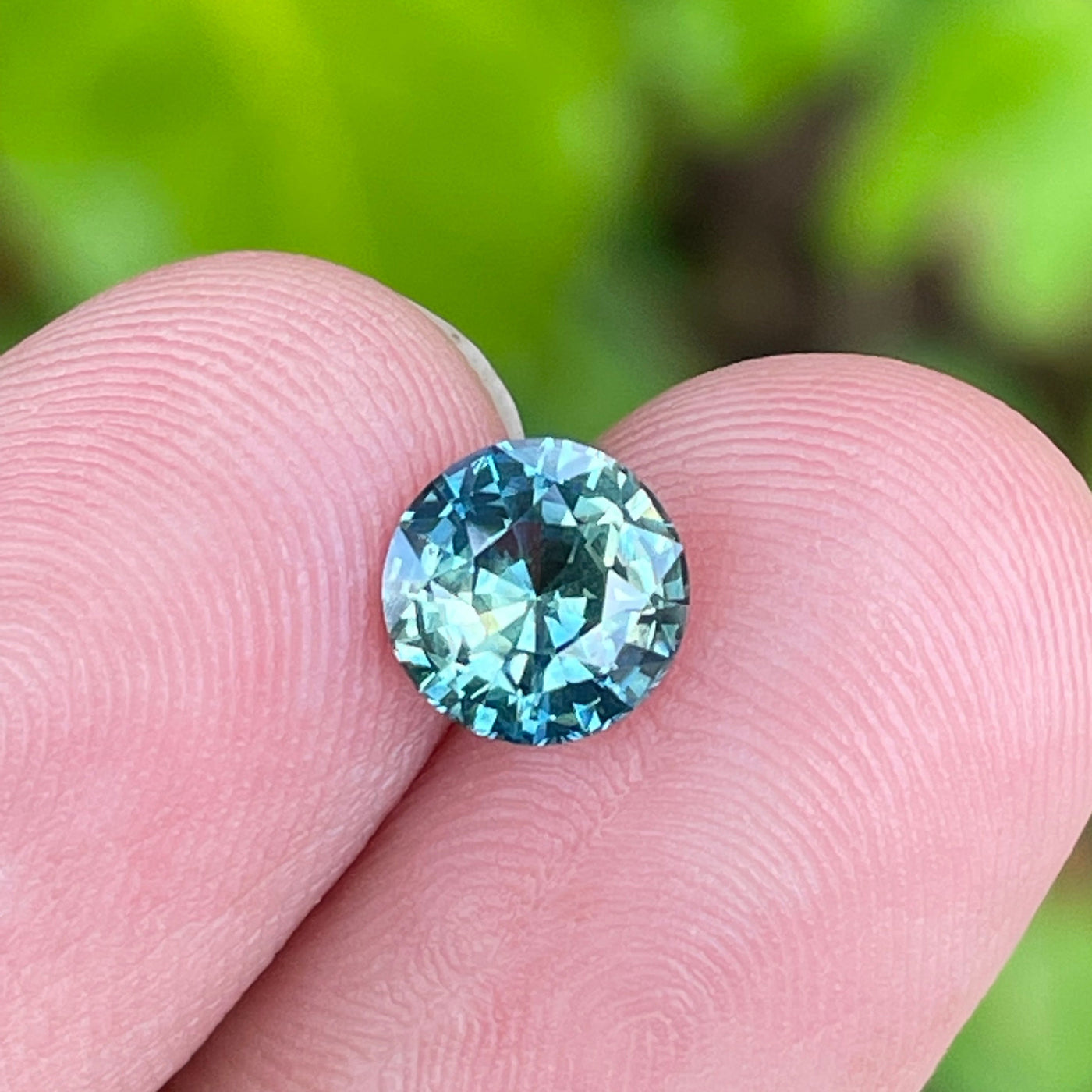 Bespoke fine unheated teal sapphire for bespoke engagement ring 