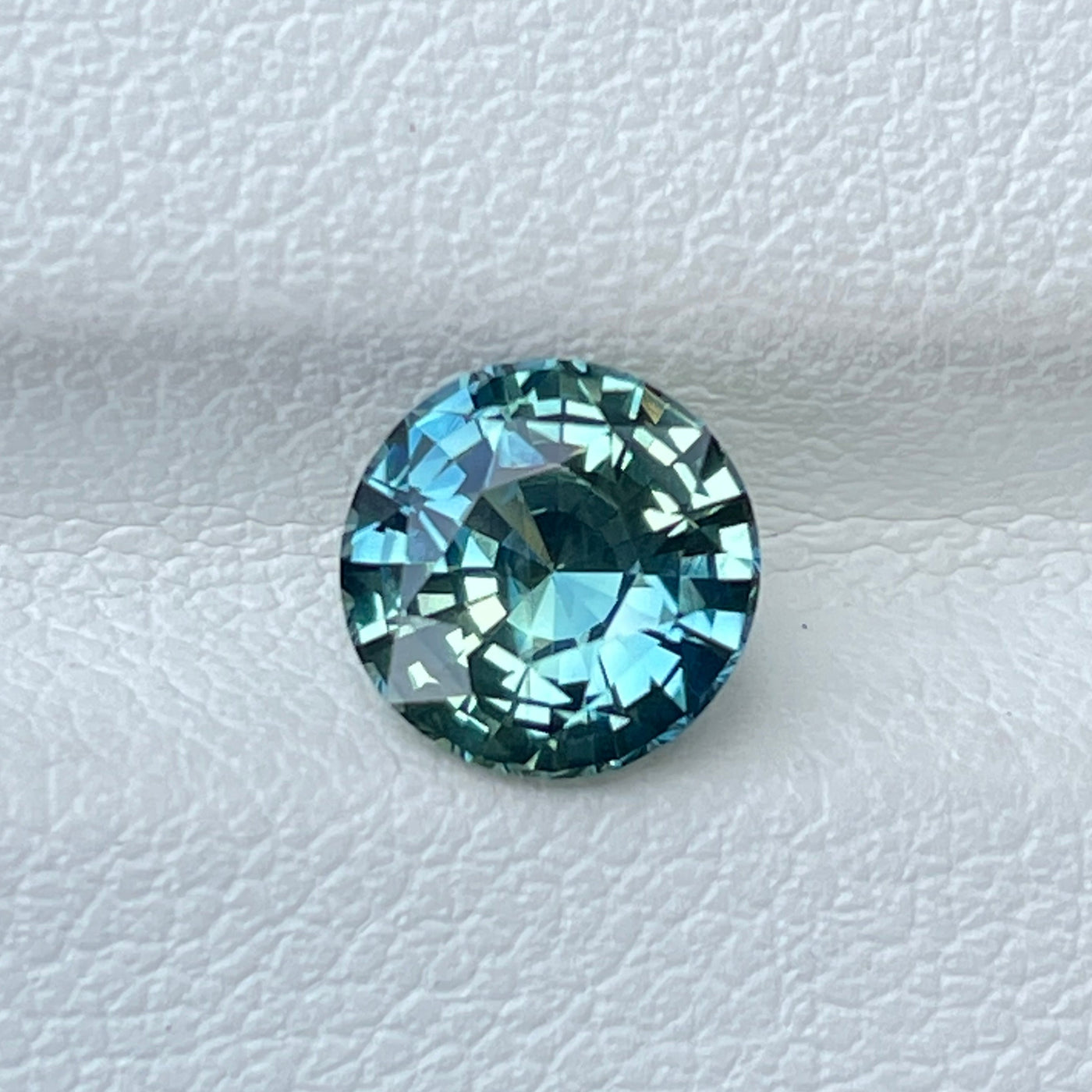 Bespoke fine unheated teal sapphire for bespoke engagement ring 