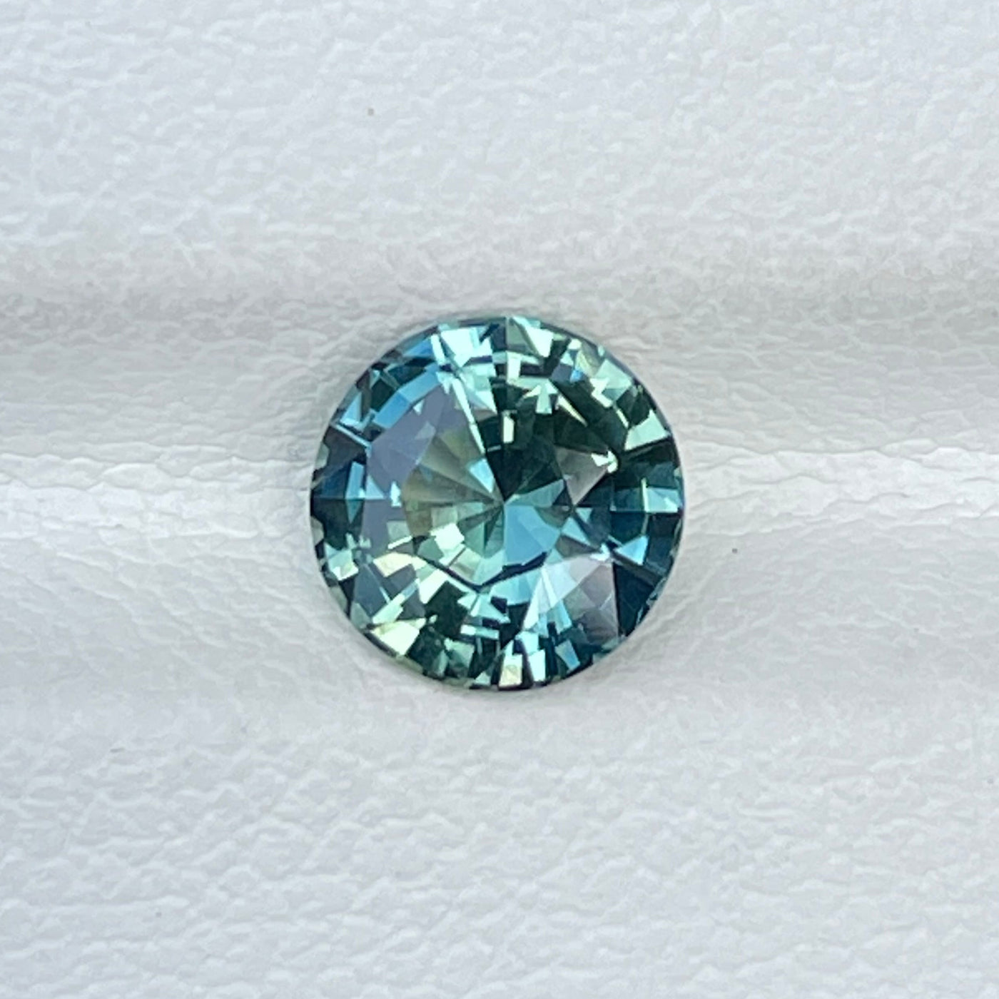 Bespoke fine unheated teal sapphire for bespoke engagement ring 
