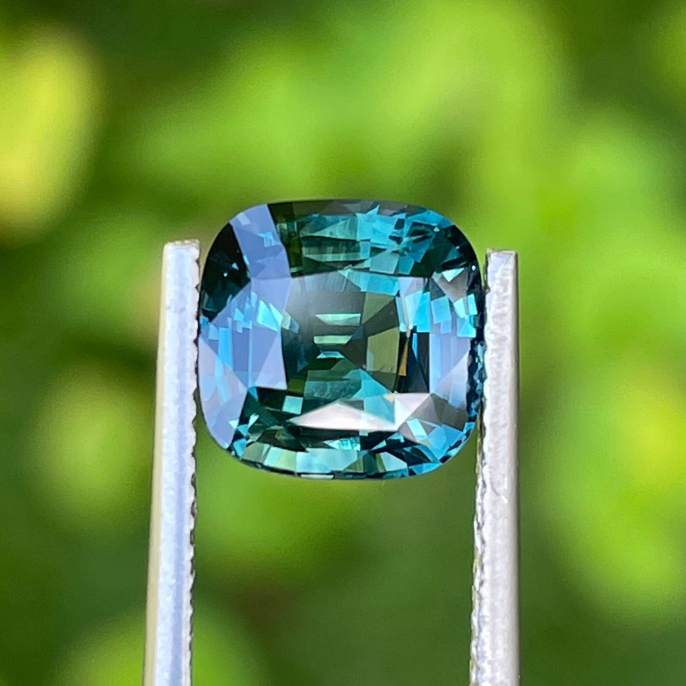 Asscher Teal Sapphire Pendant Necklace with Diamond Accents |  blingadvisor.com