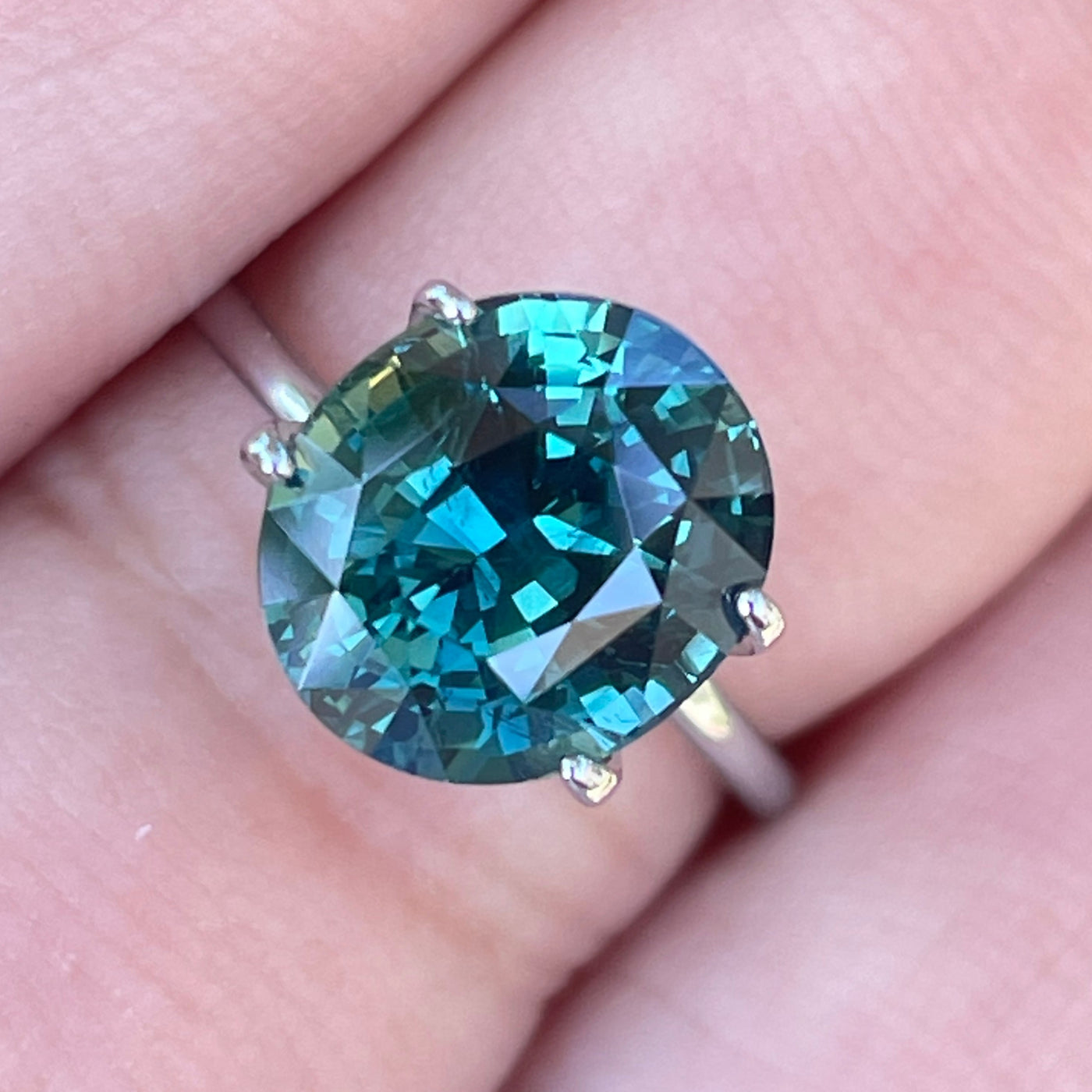 fine natural teal sapphire for bespoke engagement ring