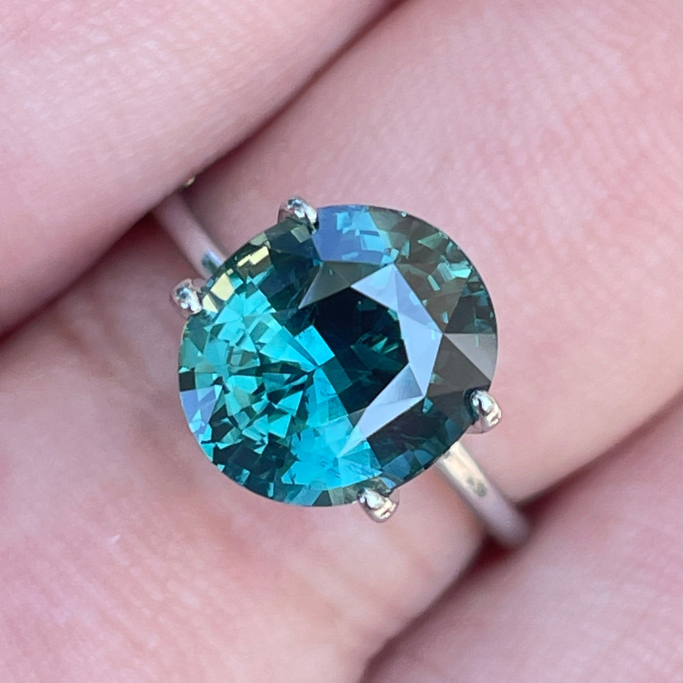 fine natural teal sapphire for bespoke engagement ring